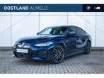 BMW i4 M50 High Executive / Schuif-kanteldak / Trekhaak / La, Gebruikt, 520 km, Met garantie (alle), Blauw