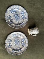 2 Adams borden en mok, Ophalen