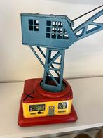 Oude blikken speelgoed kraan, Ophalen