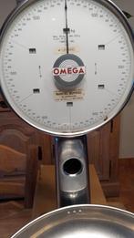 Weegschaal Omega, Ophalen