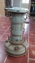 Antiek olie kacheltje, Ophalen