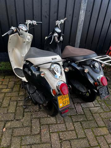 2x Sym Mio scooters - Gebruikt beschikbaar voor biedingen