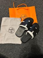 Een heel mooie hermes slippers voor manne en vrouwen, Ophalen of Verzenden, Zo goed als nieuw, Zwart