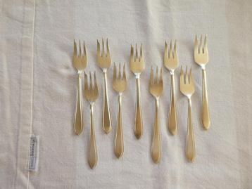 bestek vorkjes en lepeltjes nescafe  verzilverd beschikbaar voor biedingen