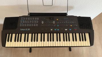 Roland E-12 keyboard Intelligent synthesizer beschikbaar voor biedingen