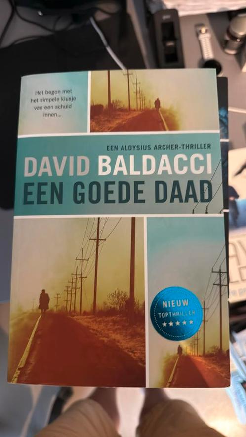 David Baldacci - Een goede daad, Boeken, Thrillers, Zo goed als nieuw, Nederland, Ophalen of Verzenden