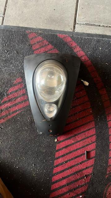 Sym mio koplamp + kap beschikbaar voor biedingen