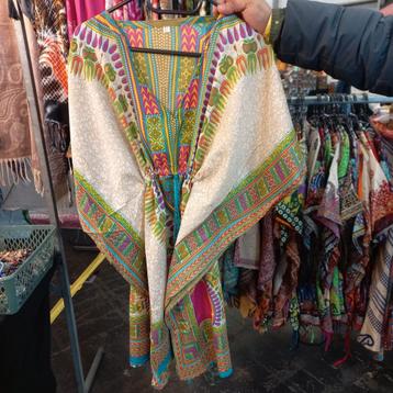 Poncho ibiza dameskleding bijna gratis beschikbaar voor biedingen