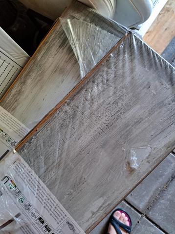 Te koop 15,5 m2 grijs/blauw laminaat nieuw beschikbaar voor biedingen