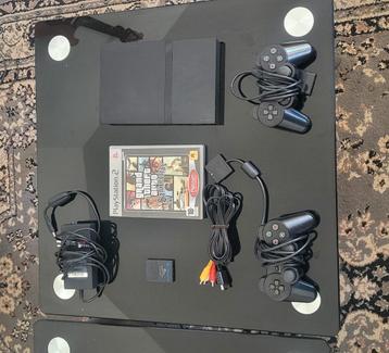 Playstation 2 slim memory card en twee controllers+spellen beschikbaar voor biedingen