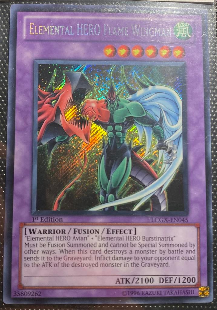 Elemental Hero Flame Wingman (1st Ed. - Secret - LCGX-EN045), Ophalen of Verzenden, Zo goed als nieuw, Losse kaart, Foil