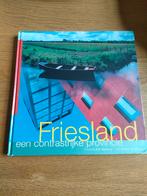 E. Hesmerg - Friesland een contrastrijke provincie, Ophalen of Verzenden, Zo goed als nieuw, E. Hesmerg; W. Stegenga