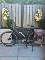 Te koop electrishe heren fiets Gazelle nette staat, Gebruikt, Ophalen of Verzenden, 59 cm of meer, 50 km per accu of meer