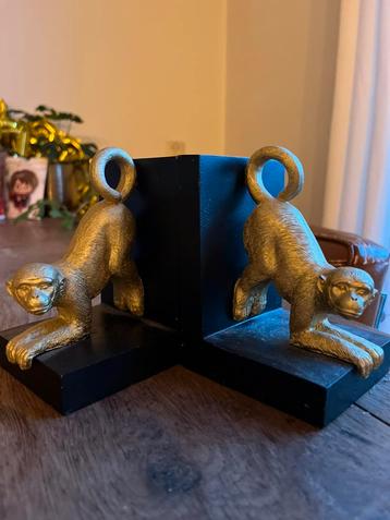 Boekensteun / boekenstandaard gouden apen beschikbaar voor biedingen