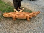 Houten krokodil. Met kettingzaag gemaakt, Slang