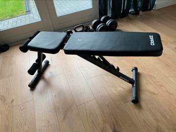 Fitnessbank instelbaar met gewichten beschikbaar voor biedingen