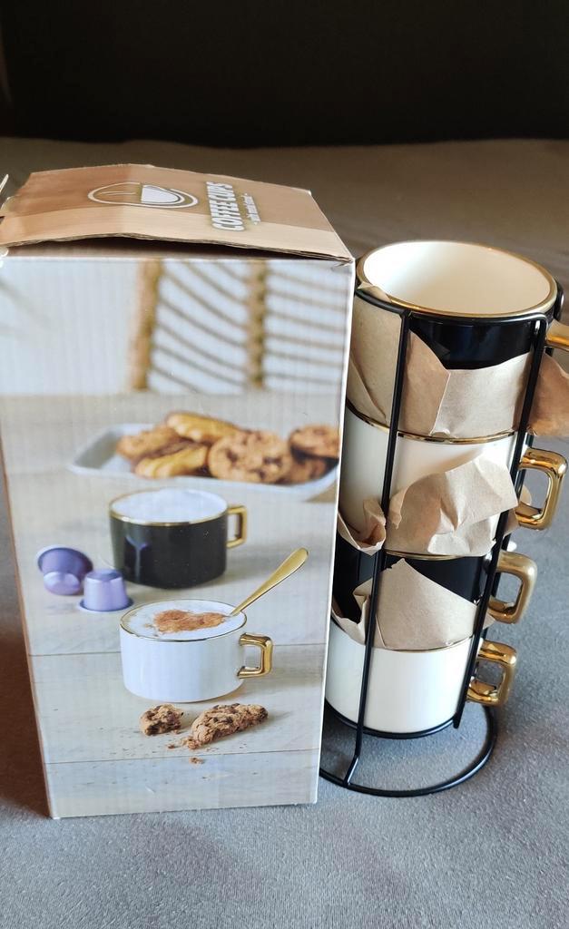 Kopjes in kopjeshouder zwart wit goud, Huis en Inrichting, Woonaccessoires | Etagères, Zo goed als nieuw, Ophalen of Verzenden