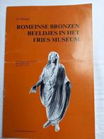 Romeinse bronzen beeldjes in het Fries museum, G. Elzinga, Ophalen of Verzenden, Gelezen, Beeldhouwkunst