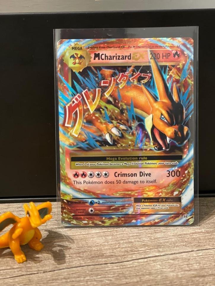 M Charizard EX 13/108 Evolutions, Hobby en Vrije tijd, Verzamelkaartspellen | Pokémon, Zo goed als nieuw, Losse kaart, Foil, Ophalen of Verzenden