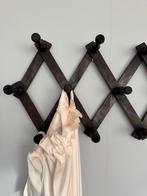 Harmonica kapstokje, Ophalen