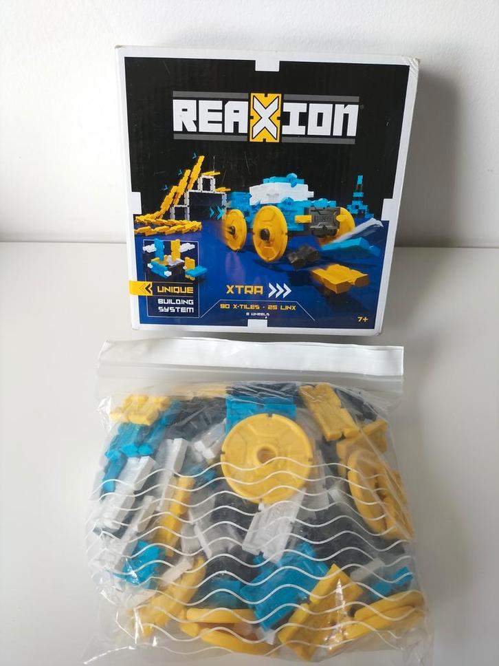 Reaxion Domino Bouwspeelgoed, Kinderen en Baby's, Speelgoed | Bouwstenen, Zo goed als nieuw, Overige merken, Ophalen of Verzenden