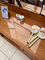 Glasplaat van kaptafel, Ophalen