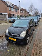 Daihatsu Cuore 1.0 5D 2007 Zwart, Auto's, Voorwielaandrijving, Stof, 600 kg, 18 €/maand