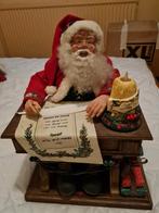 Kerstman achter bureautje, Ophalen