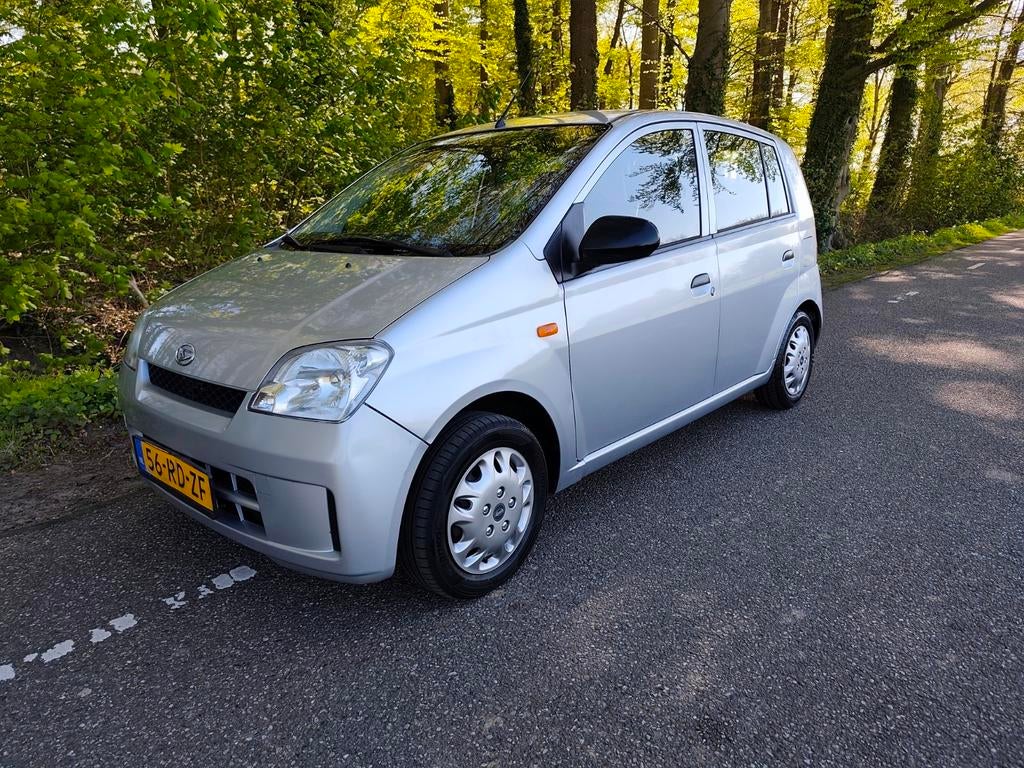 Daihatsu Cuore 1.0 5D Automaat *airco* lees tekst!! Laswerk!, Euro 5, Stof, 600 kg, Zwart