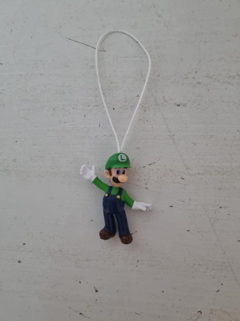 Poppetje luigi mario 4cm bijna gratis, Ophalen of Verzenden, Zo goed als nieuw, Knuffel of Figuurtje