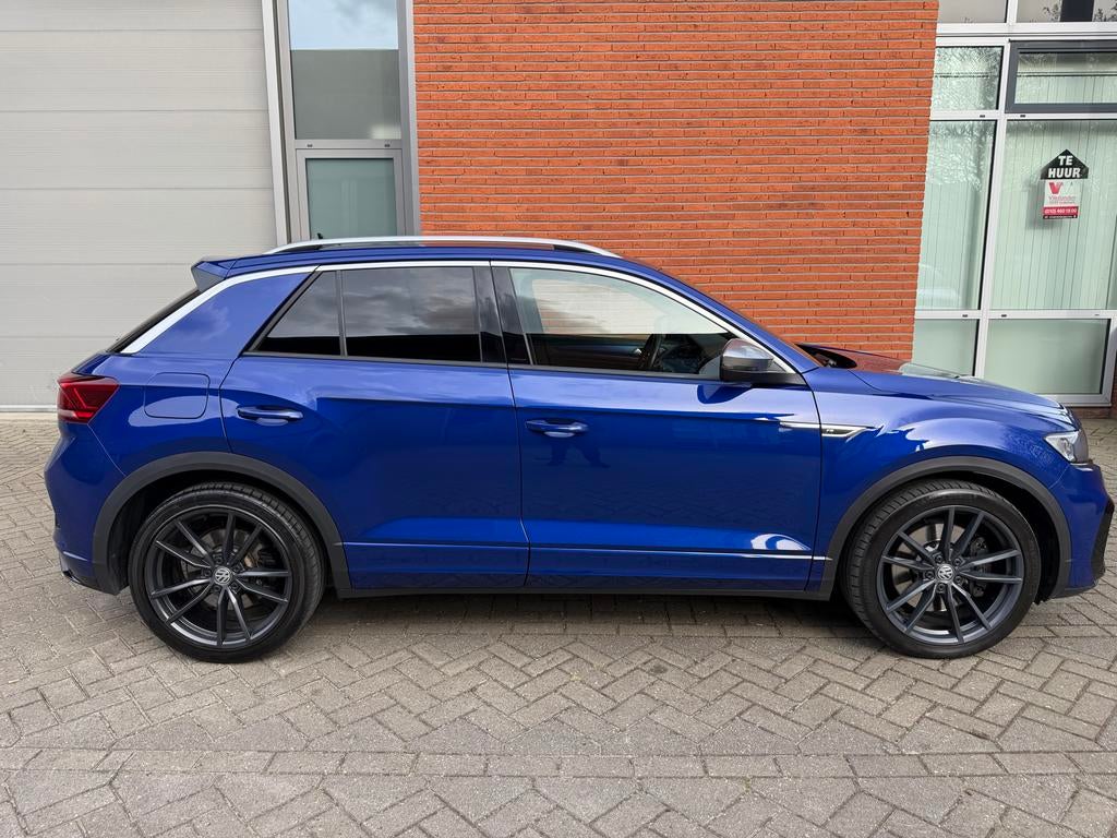 Volkswagen T-Roc 2.0 TSI 300 PK PANO/LEER/AKRA full option, Auto's, Automaat, 4 cilinders, 1984 cc, Blauw