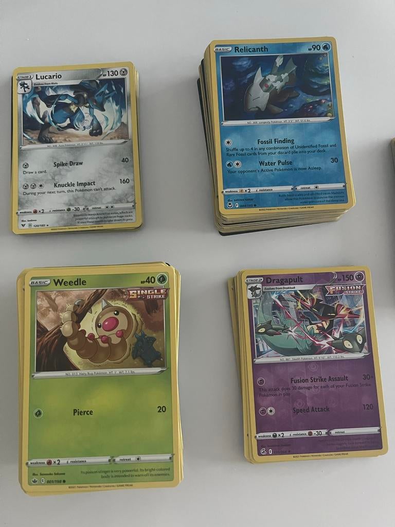 Pokemon Bulk kaarten Sets: /198, /185, /195, /203, /265., Foil, Nieuw, Meerdere kaarten, Ophalen of Verzenden