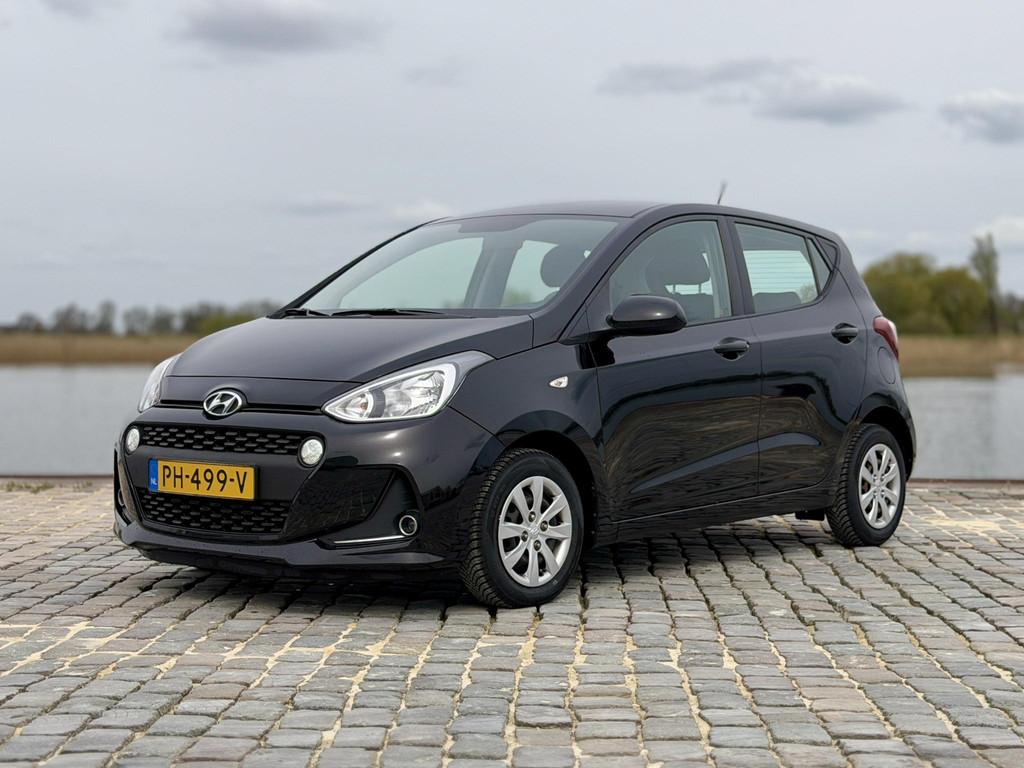Hyundai i10 1.0i Go!|Bluetooth|Cruise|Navi|Clima, Auto's, Hyundai, Voorwielaandrijving, Euro 5, Stof, Gebruikt