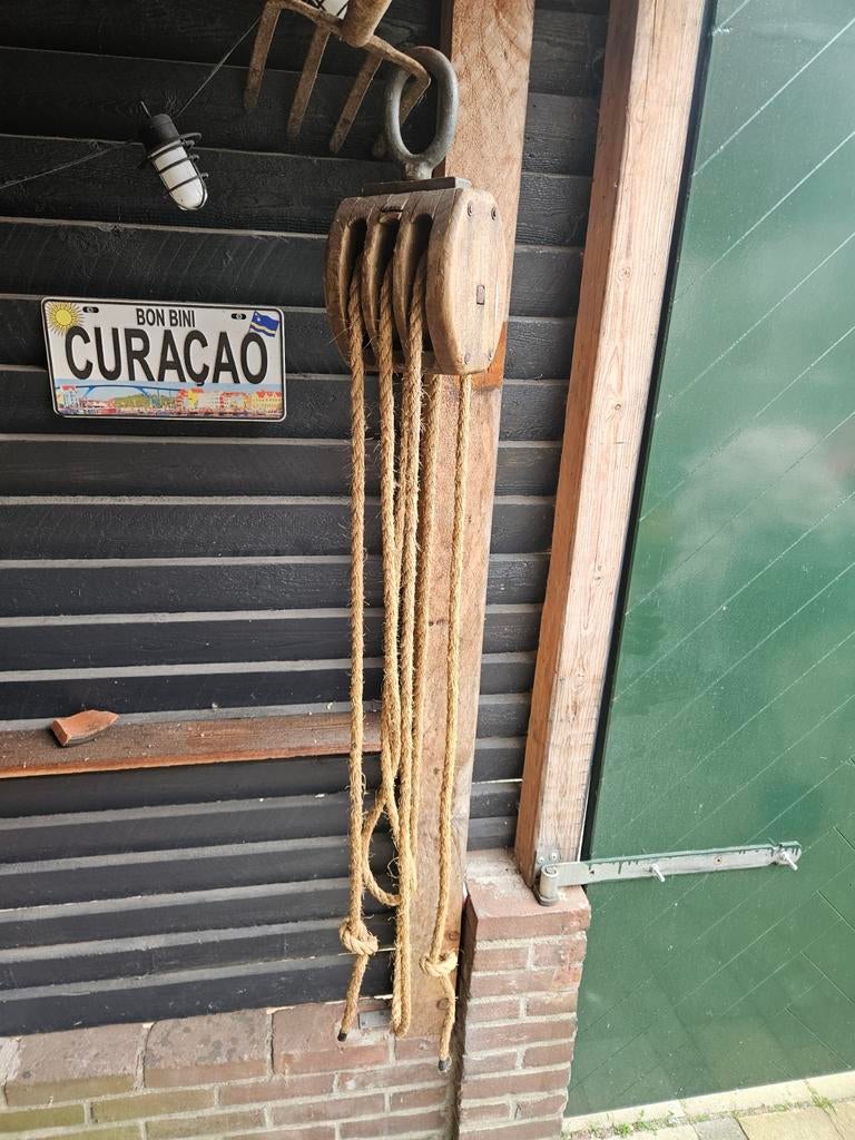 Houten katrol, Ophalen