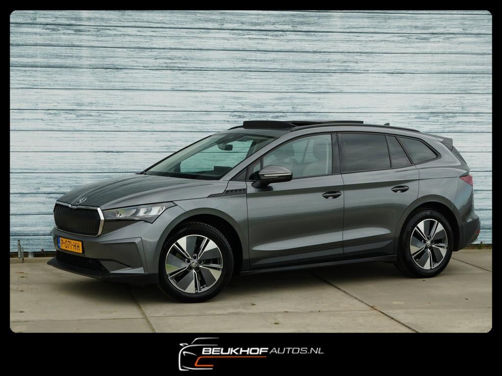 Skoda Enyaq iV 60 Leer Carplay Trekhaak Pano Soh 91.5% Cam, Auto's, Automaat, Achterwielaandrijving, Gebruikt, Lichtsensor
