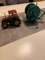 Britains newholland/ fiatagri L85 met sproeiwagen, Hobby en Vrije tijd, Ophalen of Verzenden, Nieuw, Tractor of Landbouw, Britains
