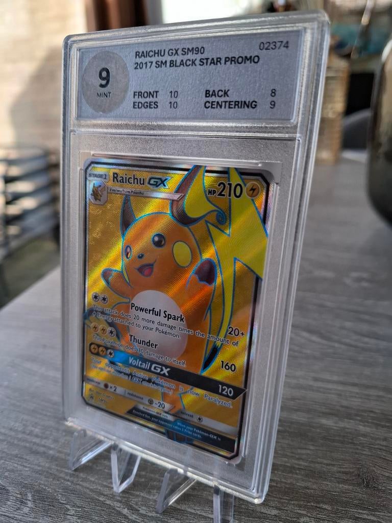 Pokémon kaart Raichu GX SM90 Black Star Promo PSA 9, Hobby en Vrije tijd, Verzamelkaartspellen | Pokémon, Ophalen of Verzenden