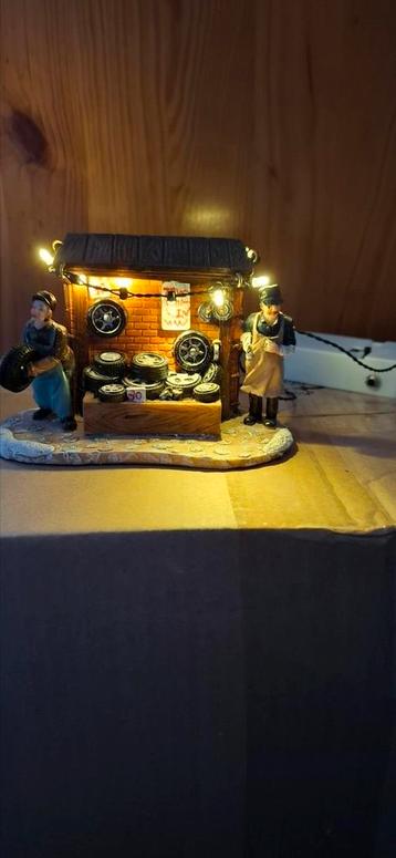 Kerstdecoratie bandenshop  beschikbaar voor biedingen