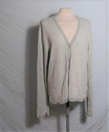 Leuk grijs damesvest.Knoopsluiting.Mt L beschikbaar voor biedingen