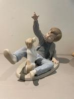 Porseleinen beeld Nao by Lladro Jongen met hond. Lichtblauw., Antiek en Kunst, Antiek | Porselein, Ophalen