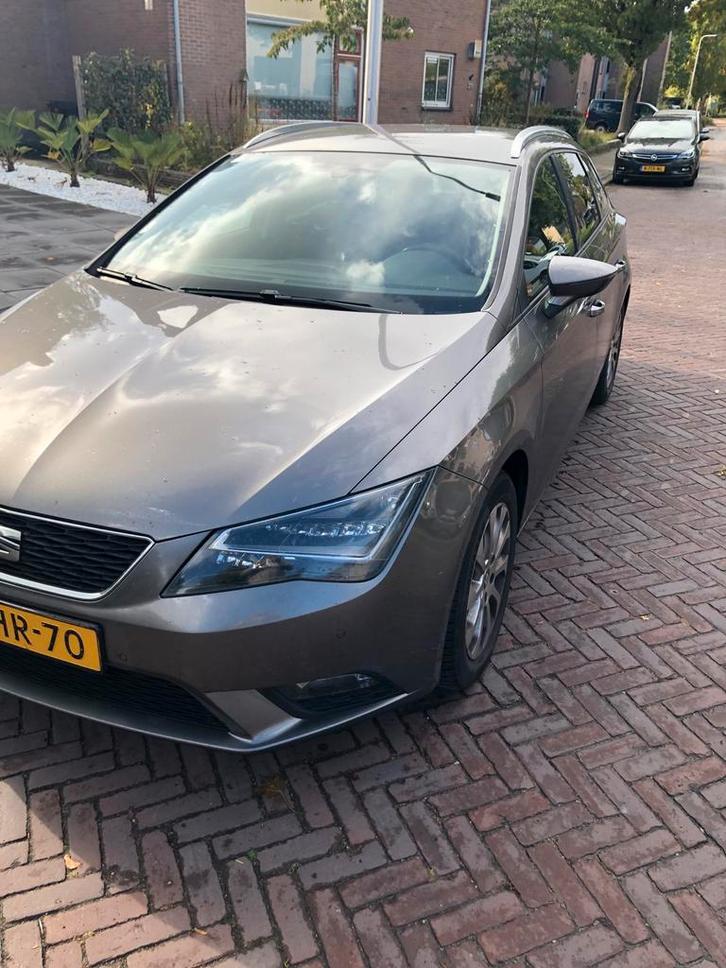 Seat Leon 1.6 TDI 81KW ST 2014 Grijs, Auto's, Seat, Particulier, Leon, Diesel, A, Stationwagon, Handgeschakeld, Origineel Nederlands