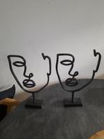 Twee zwarte metalen gezichtsbeelden, Ophalen, Zo goed als nieuw