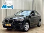 BMW X1 sDrive20i *192PK* Stoelverwarming / Navigatie / PDC /, 1998 cc, Stof, Zwart, Bedrijf