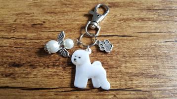 Sleutelhanger Bichon frise met beschermengeltje beschikbaar voor biedingen