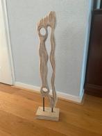 Houten abstract beeld, Ophalen