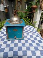 Oude hand koffie molen, Ophalen