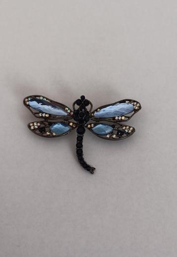 Libelle broche beschikbaar voor biedingen