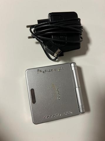 Nintendo Game boy advance sp met oplader zilver beschikbaar voor biedingen