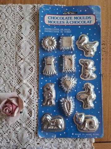 12 Mini chocolade vormpjes in de originele verpakking beschikbaar voor biedingen