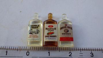 Poppenhuis: Whiskey Flessen beschikbaar voor biedingen